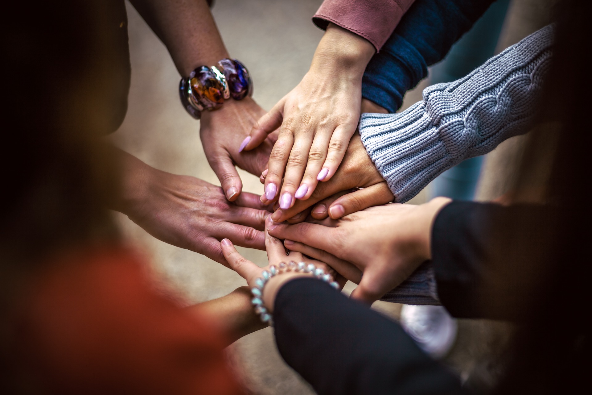 A diverse group of foster and adoptive parents connecting in the Redeemed Arrow community.